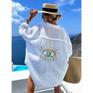 Women’s sequined pocket shirt with eye-catching sun motif, casual V-neck long-sleeve top for spring and autumn, fashionable everyday wear for beautiful women GARMENTARY