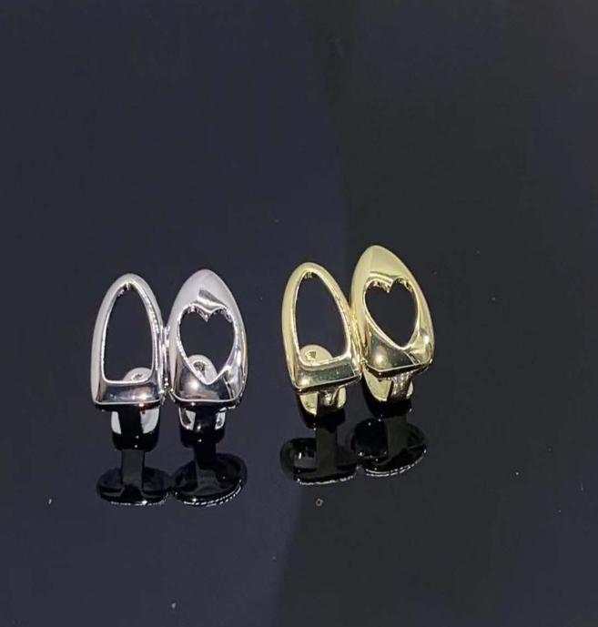 Double Tooth Hollow Heart Grillz - Smooth Gold Finish Dental Accessory, Hip-Hop Street Style Piece for Daily Outfits, Wear for Parties to Command Attention, Enhance Look Fashion Costume Jewelry, Double Tooth Grillz