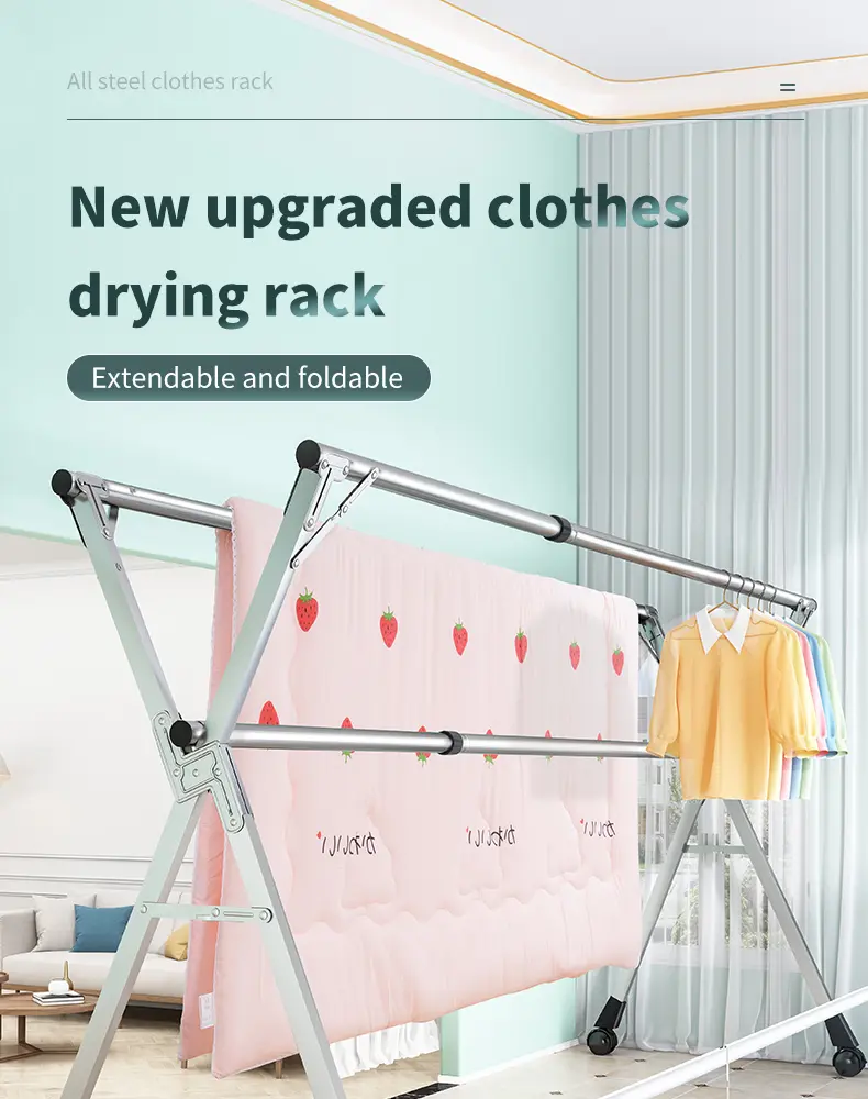 Extendable stainless steel drying rack holding clothes and a quilt