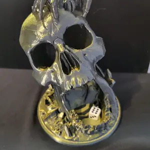 3D-printed Skull Display with Rolling Dice Slot for Unique Tabletop Decor