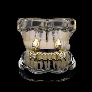 3pcs Golden Hollowed-Out Fangs Grillz Set, 3D Textured Edgy Hip-Hop Oral Dental Jewelry, Golden-Plated Versatile Grills for Men, Ideal for Parties, Gift-Giving Occasions