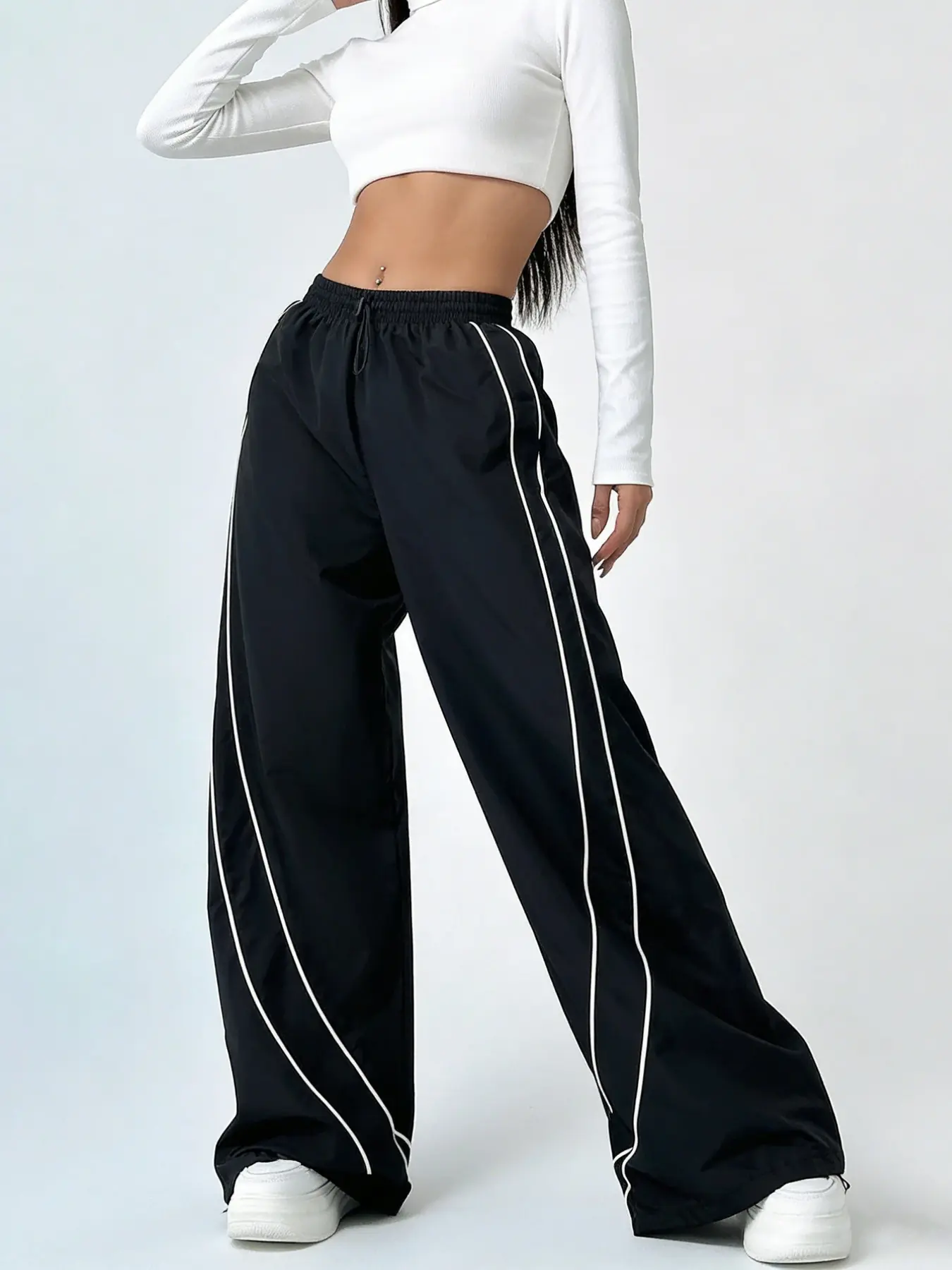 A women's spicy girl style, Casual Fashion Loose, contrasting color line wide leg pants, curved white border American street style wide leg sports pants, suitable for all seasons, home, indoor, and outdoor wear