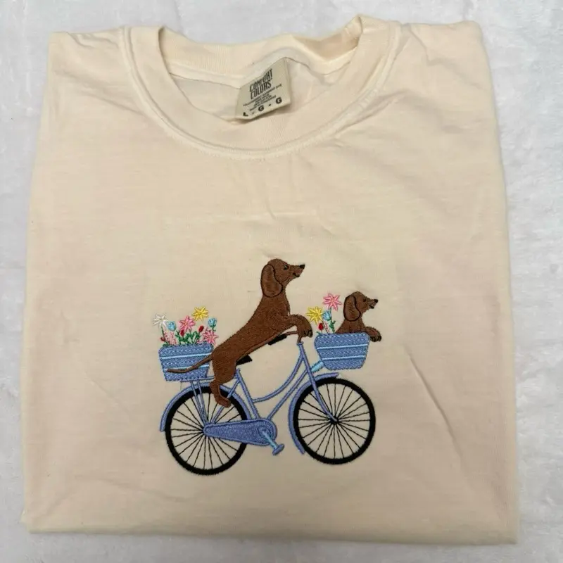 Cute dachshunds in bike floral spring embroidered comfort colors T-shirt/ doggie tshirt/ dachshund tshirt spring