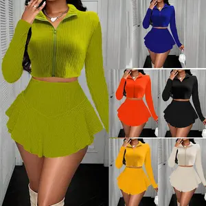 Women's two-piece dress set: a long-sleeved crop top paired with a pleated mini skirt, perfect for parties; or a solid-color zip-up crop top paired with a ruffled skirt.