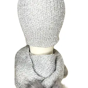 Handmade scarf and hat set with faux fur poms