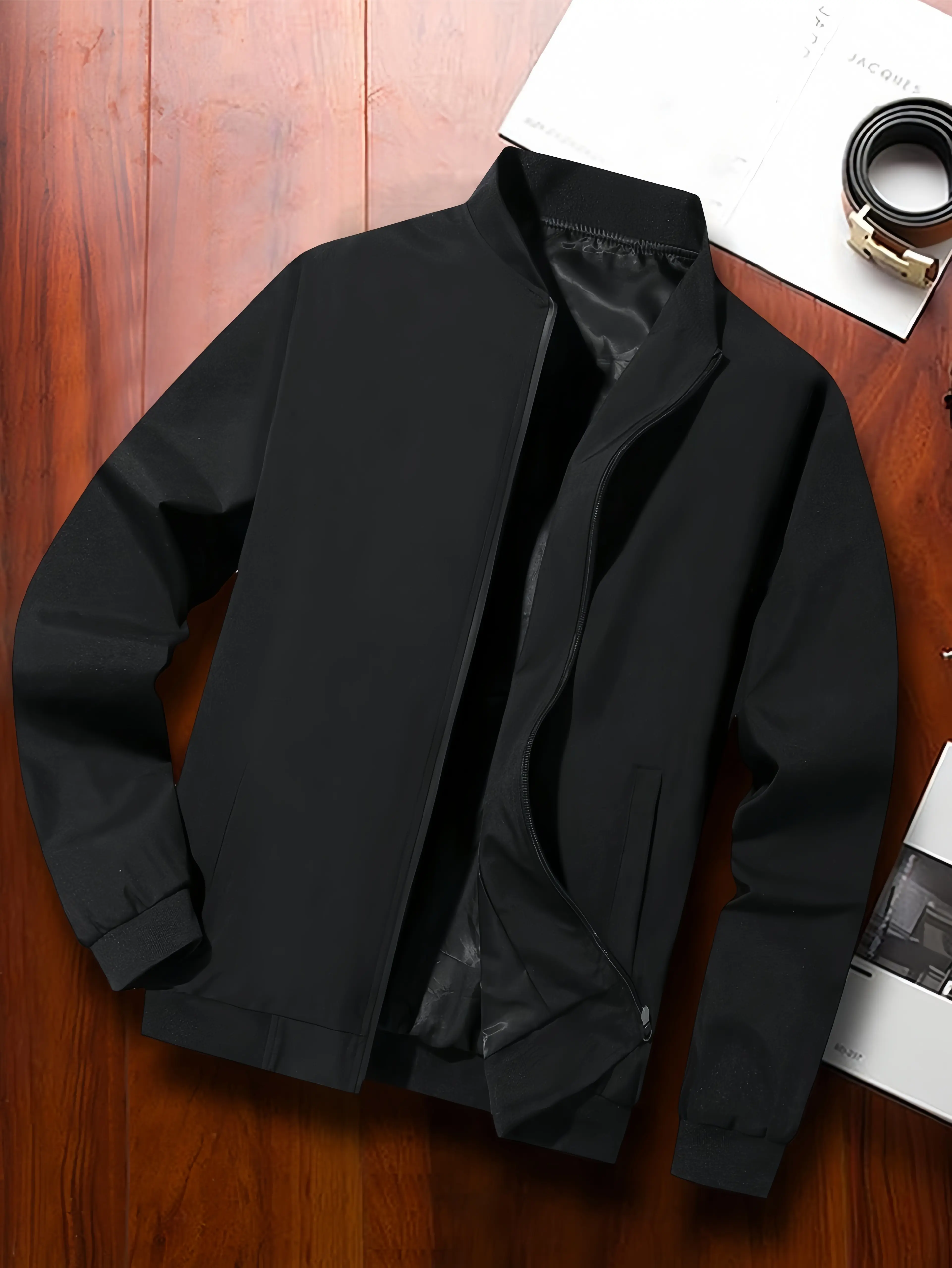 One black men’s jacket with a stand collar and zipper, urban casual style with ribbed hem and side pockets; structured fabric suitable for men’s everyday commuting and business occasions—low key, versatile, minimalist, and visually appealing. fathersdaygi