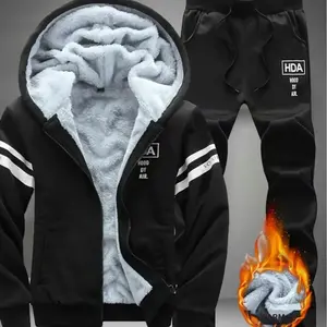 A set of fleece lined hooded sweatshirts, featuring a casual and stylish warm design. The hooded sweatshirt includes a fashionable drawstring hood and white stripes on the sleeves with an iconic logo, adding a trendy touch. Made of fleece material for war