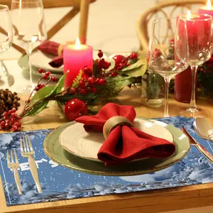 Set the Festive Mood! 4pcs Snowman Christmas Placemats with snowflakes & berries. Durable polyester mats for holiday dining decor. Create your winter wonderland table!