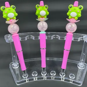 Frog Themed Custom Pens with Pink Handles and Glitter Accents for Unique Writing Experience