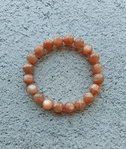Orange Moonstone Beads Bracelet. Enhances self-confidence, improves mood, attracts love, wards off evil, dispels negative energy, boosts creativity. Consecrated by a Taoist master.