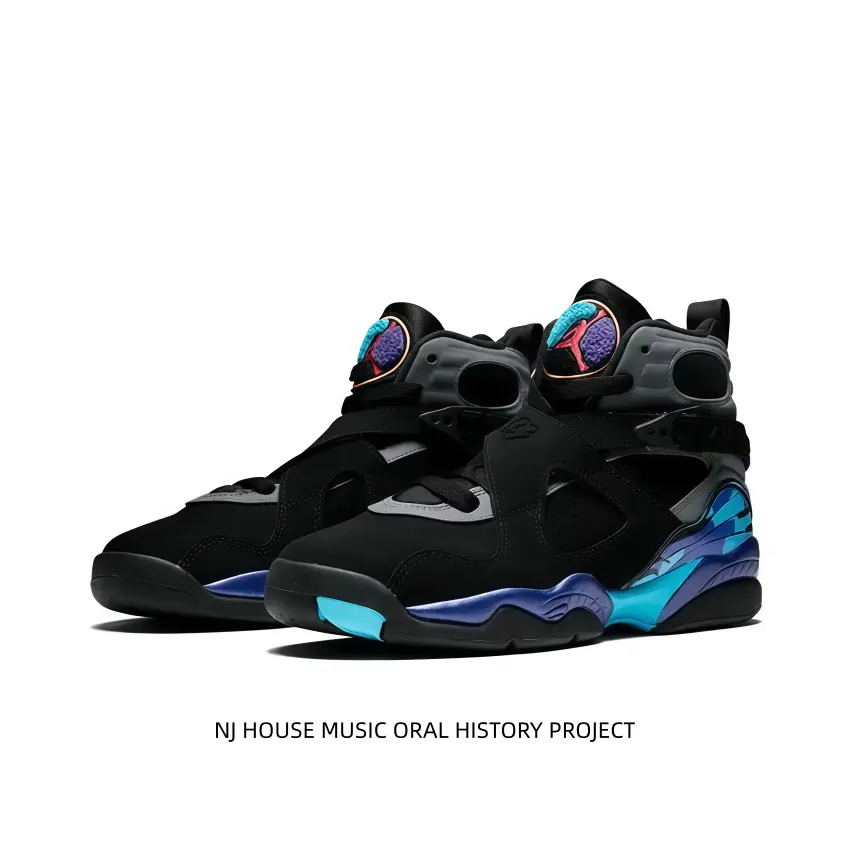 Black suede high-top sneakers decorated with gradient blue-purple side panels and colorful tongue logos. Adjustable buckle strap stabilizes ankles, cushioned sole fits street styling and daily casual walking.