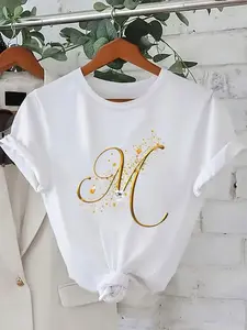 Golden Cursive Initial Letter M Print White T-Shirt Decorated with Golden Sparkles And Hearts Short Sleeve Casual Top Multiple Sizes Available Perfect for Daily Casual Wear And Outdoor