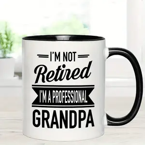 1pc 11oz "I'm Not Retired I'm a Professional Grandpa" Funny Ceramic Coffee Mug - White with Black Lettering, Humorous Birthday Gift for Grandfathers, Durable All-Season Hot & Cold Drinkware, Seasonal Beverage Cup, Contrasting Handle Design, Quality Grandp
