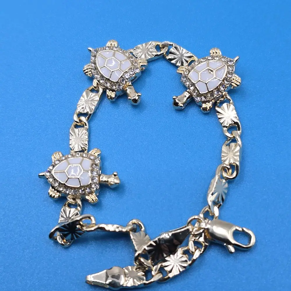 N104-7-Inch Long White Tortoise Bracelet with Mini Paved Clear Zircon Copper Gold Plated Not Water Resistant Stylish Accessory for Everyday Wear