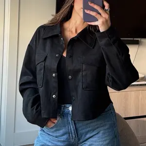 Black Suede Jacket with Relaxed Fit Button-Down Front and Front Pockets Versatile Staple for Casual Looks