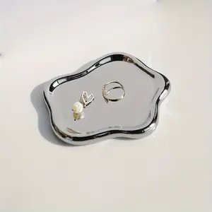 A Ceramic Display Tray with White Cloud Decorations, Aromatherapy Candle, and Key Storage Tray for Earrings, Rings, Necklaces, and More
