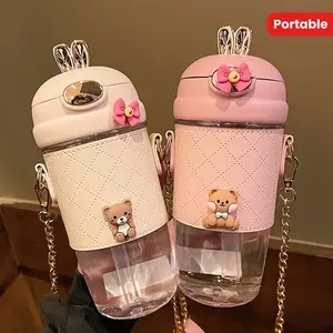 19.61oz Portable Sports Water Bottle with Shoulder Strap Fashionable Straw Water Bottle with 3D Stickers