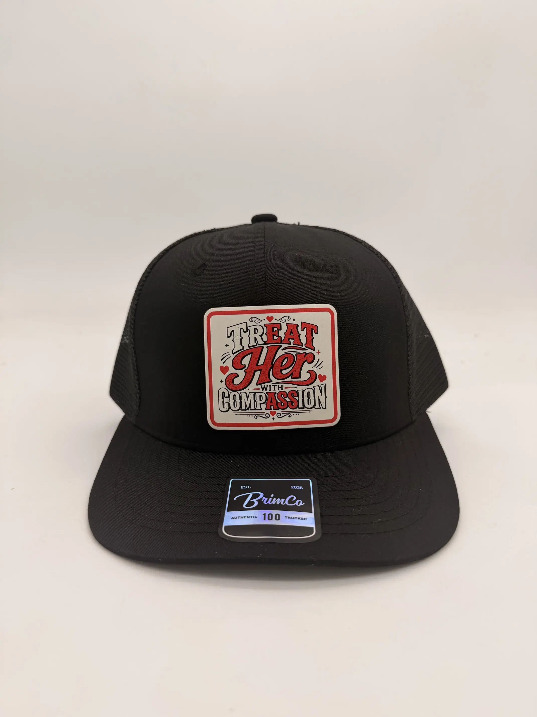 Treat Her With Compassion BrimCo Trucker / Performance Hat