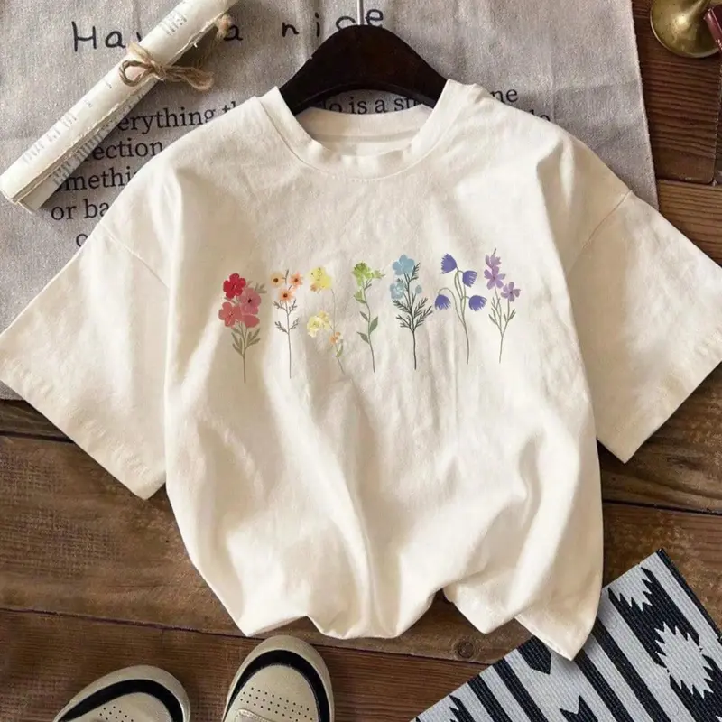 Retro Rainbow Wildflower Botanical Graphic T-Shirt, Vintage Boho Colorful Floral Print Oversized Crew Neck Tee, Women's Short Sleeve Streetwear Cotton Top, Trendy Cottagecore Aesthetic Shirt for Plant Lovers, Nature Enthusiasts and Casual Outfit Fans