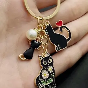 Black Cat Keychain with Pearl and Floral Design for Stylish Key Attachments
