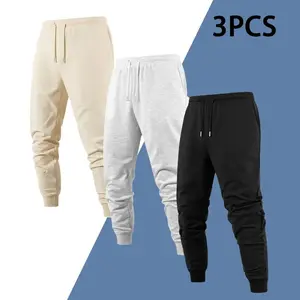 3-Pack Men's Solid Color Jogger Pants: Trendy Timeless Cut, Durable Fabric for Daily Wear, Adjustable Drawstring for Custom Fit (Snug/Loose), Elastic Cuffs to Prevent Riding Up, Roomy Pockets for Storage, Reliable Go-To Pants for Any Casual Occasion