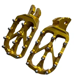 Return, Warp 9 Elite Surron pegs Gold and Black
