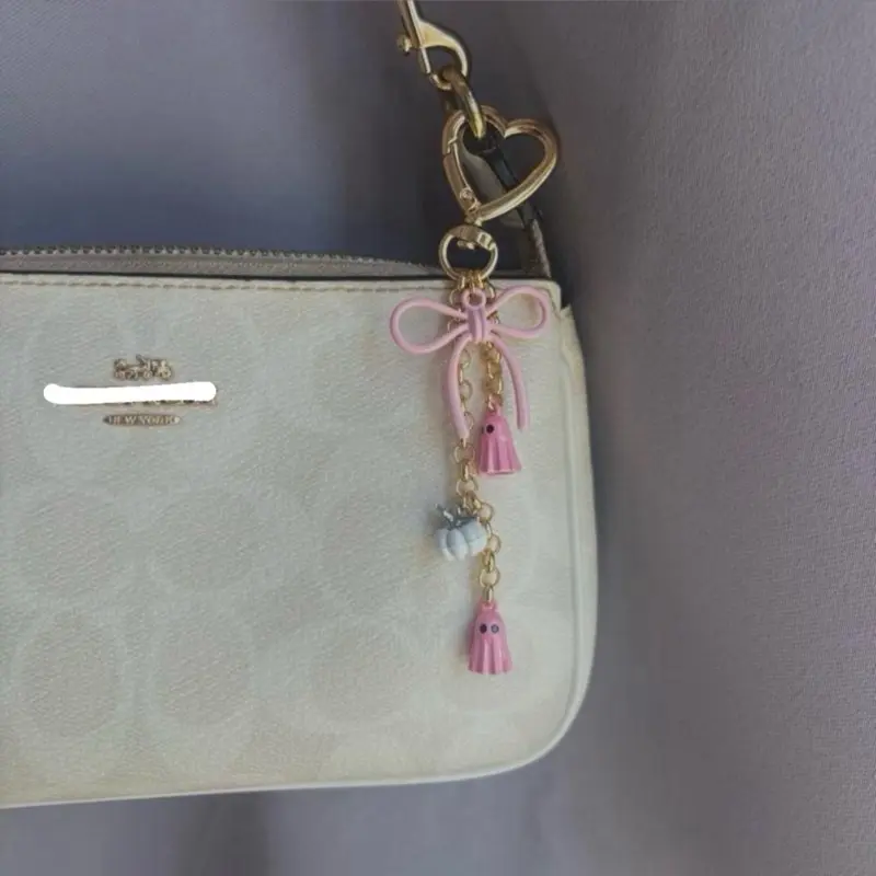 Coquette Ghostly Charm for Bags - Pink Bow & Tassel Design with Heart-Shaped Hook