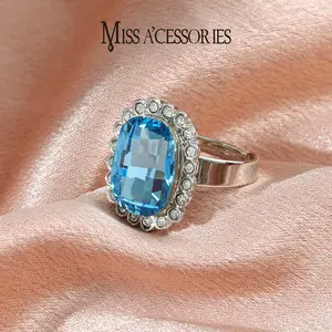 Blue Oval Crystal Halo Ring | Sparkly CZ Floral Border Silver Tone Viral  | Simulated Aquamarine Statement Ring | Luxury Blue Crystal Statement Ring | Timeless Vintage Evening Wear Jewelry | Perfect Gift for Her: Blue Oval Crystal Floral Halo Ring