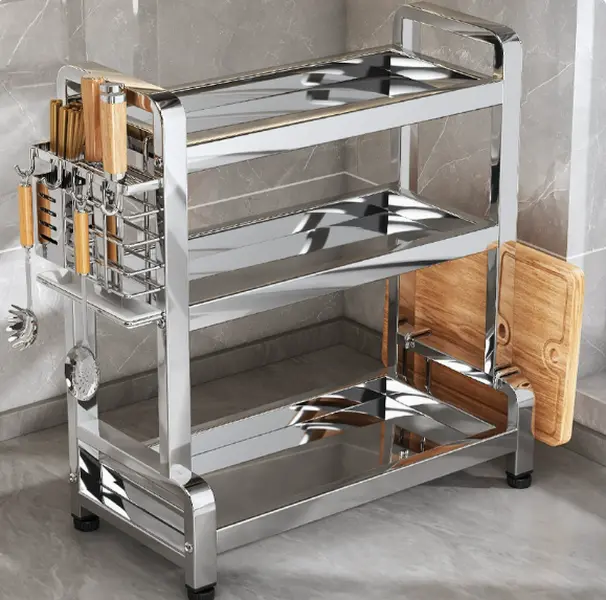Three-tier stainless steel kitchen storage rack with multi-functional side slots. Store tableware, seasonings and knives neatly, saving counter space and keeping your cooking area tidy.