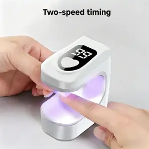 A mini ultraviolet gel nail lamp, small and portable, USB charging nail curing lamp, 2 timed modes, used for gel nail curing, suitable for home and nail studio