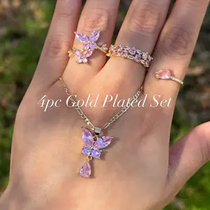 Gold Plated Butterfly Set Includes- 4pcs Total (one necklace, One size ring and two adjustable rings)