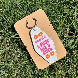 OOPSIE I JUST HIT A CURB keychain