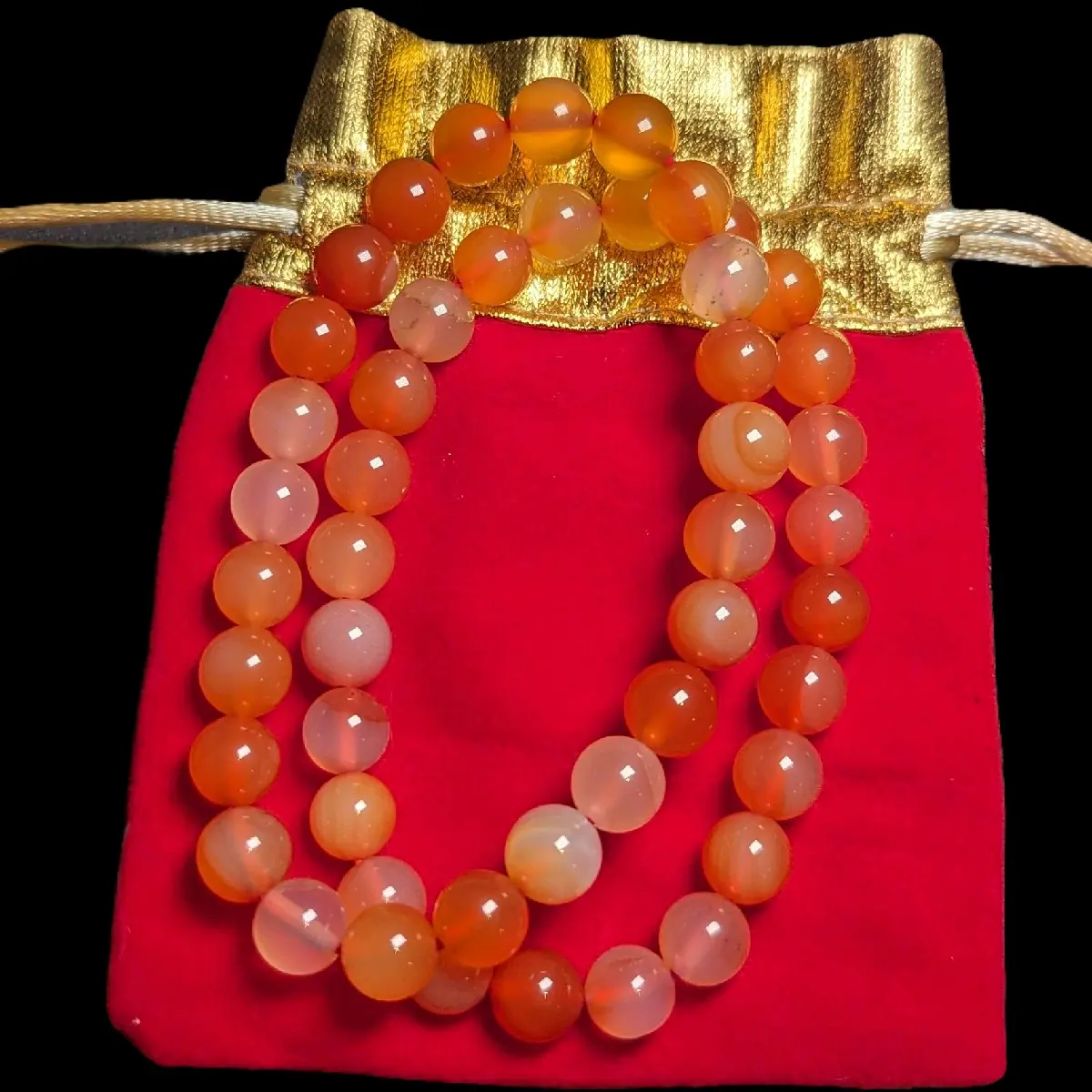 2 Year of the Dragon bracelets, orange jade beads
