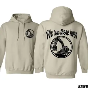 We Run These Hoes Excavator Operator Hoodie – Heavy Equipment Graphic Pullover, Bold Construction Workwear for Dirt Crew & Jobsite Operators, Winter Gift for Machine Runners