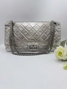 Pre-owned CHANEL Reissue 2.55 Maxi Flap Bag in Silver Metallic Quilted Leather, Ruthenium Hardware & Triple Chain Strap