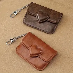 Heart-patterned mini coin purse, modern women's wallet - compact multi-card slot keychain design, heart-shaped cutout button closure, available in black, brown, and burgundy colors, everyday fashion accessory, metal ring pendant
