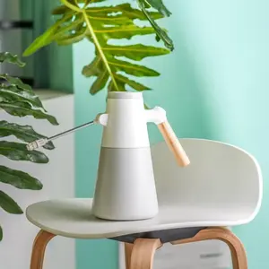 Battery-powered high-pressure automatic electric spray bottle for home gardening and air purification cleaning; no charging required—portable mist sprayer for plant care and garden irrigation; wood grain design is convenient, easy to use, stylish, aesthet