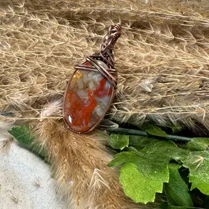 Agate wrapped in Oxidized Copper.