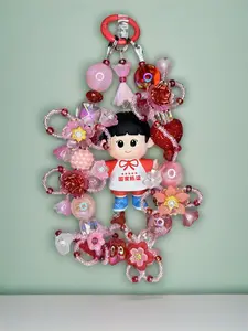 Adorable Kid Figure in Red Bag Charm Design with Intricate Flowers, Beads and Heart