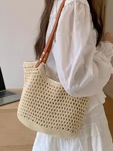 Holiday style fashion woven shoulder bag, contrast leather shoulder strap design, hollow crocheted texture commuter shoulder bag, niche design casual everyday versatile shoulder bag, suitable for shopping and dating, Handcrafted Bag