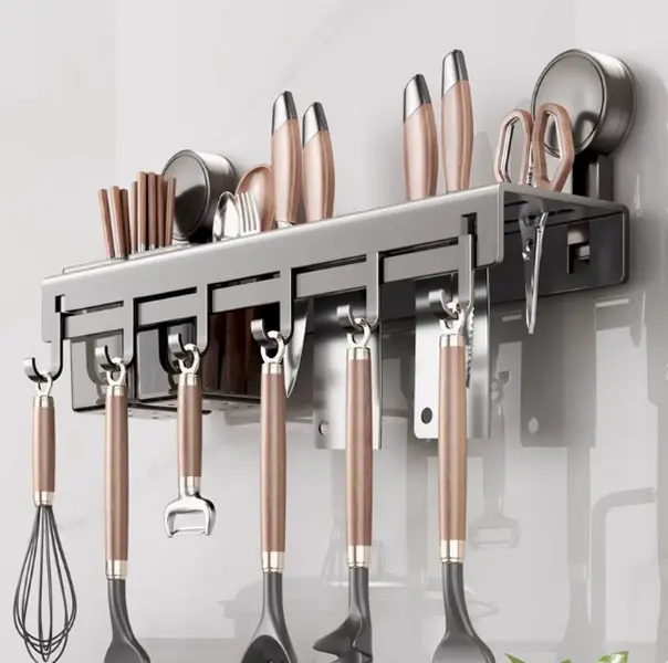 Wall‑mounted kitchen utensil storage rack with knife slots and multiple hooks, sturdy metal build, holds knives, spoons and chopsticks to free up precious countertop space