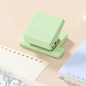 1 five-hole puncher, a page clip with a puncher, suitable for A4, A5, B5 and various types of paper. Notebook and office study supplies can be punched using a manual puncher (blue + white + green)