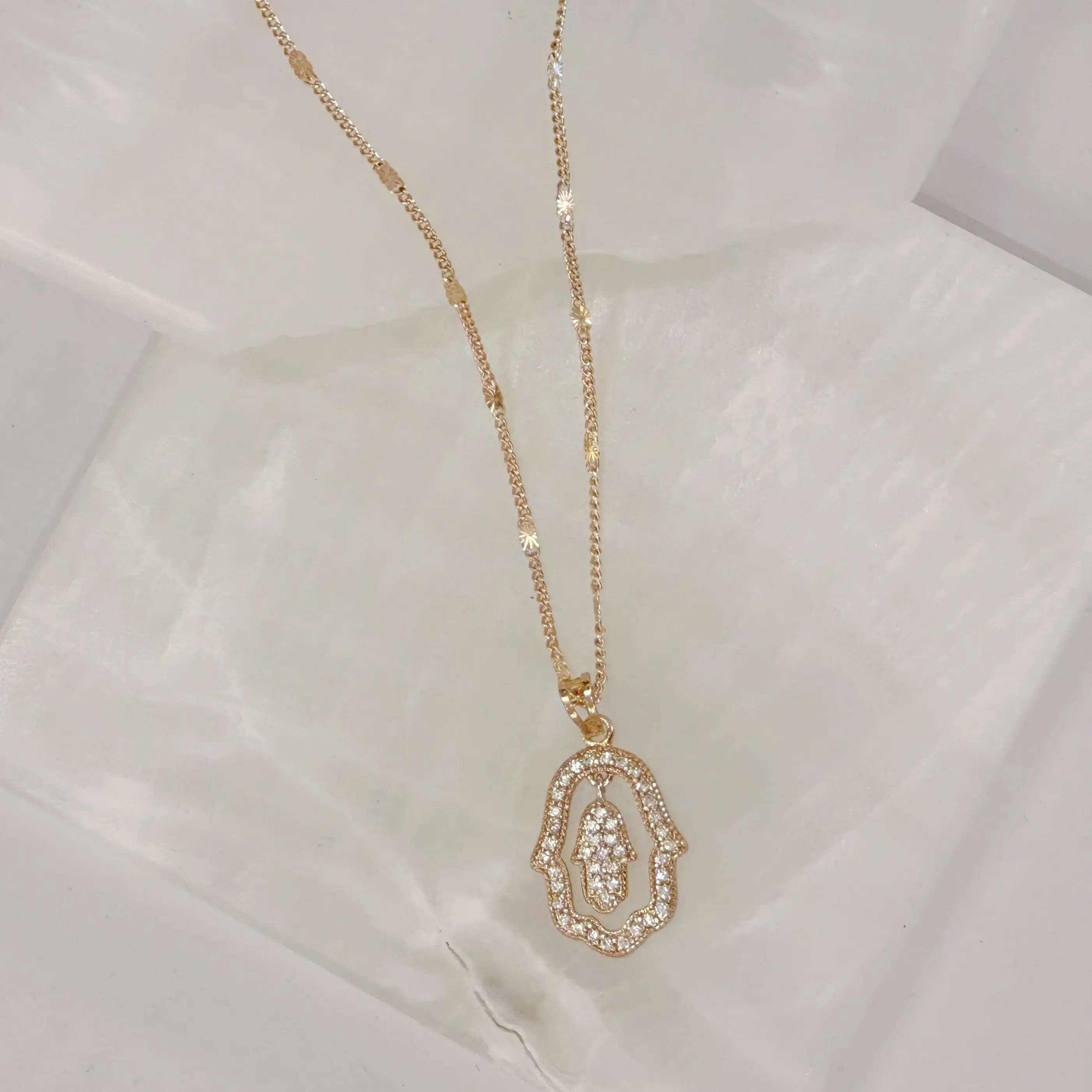 GOLD DOUBLE HAMSA CRYSTAL necklace