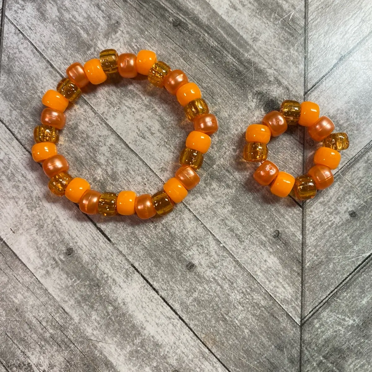 Orange sparkly bracelet and ring :3