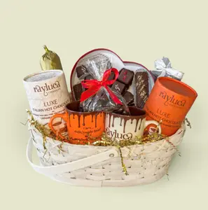 HIGHER DREAMS & DELIGHTS GIFT BASKET, Lovers Everything Bundle chocolate sampler, edible chocolate cookie dough roll, chocolate bark, dark chocolate almonds, both versions of Italian Hot Chocolate, pairing with our signature custom coffee mugs.
