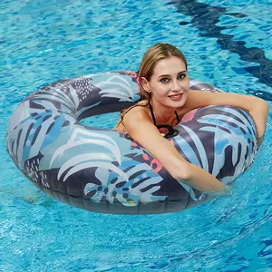 Blue leaf swimming float, inflatable buoyancy ring for use outside the beach pool.