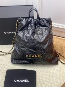 Pre-owned CHANEL Lambskin Shoulder Bags 22 Bag Black and Gold Backpack (Chip Design)