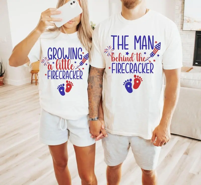 Growing A Little Firecracker Pregnancy Announcement 4th of July Couple Matching Shirts, The Man Behind The Firecracker Couple Tees, Expecting Parents Tee
