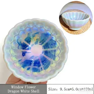 41.  Window Paper-Cut Dragon with White Shell Jianzhan Cup