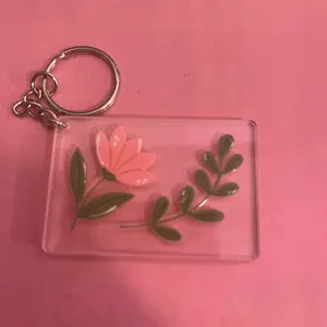 Floral Keychain with Pink Flower and Green Leaves Design